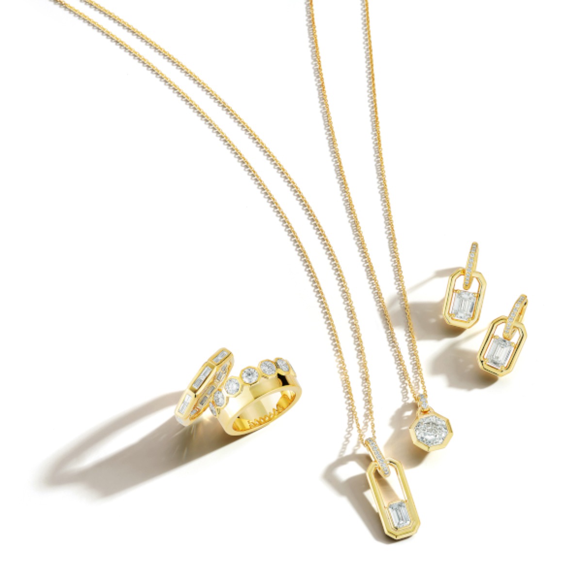 Gold neck rings by Clyde Duneier
