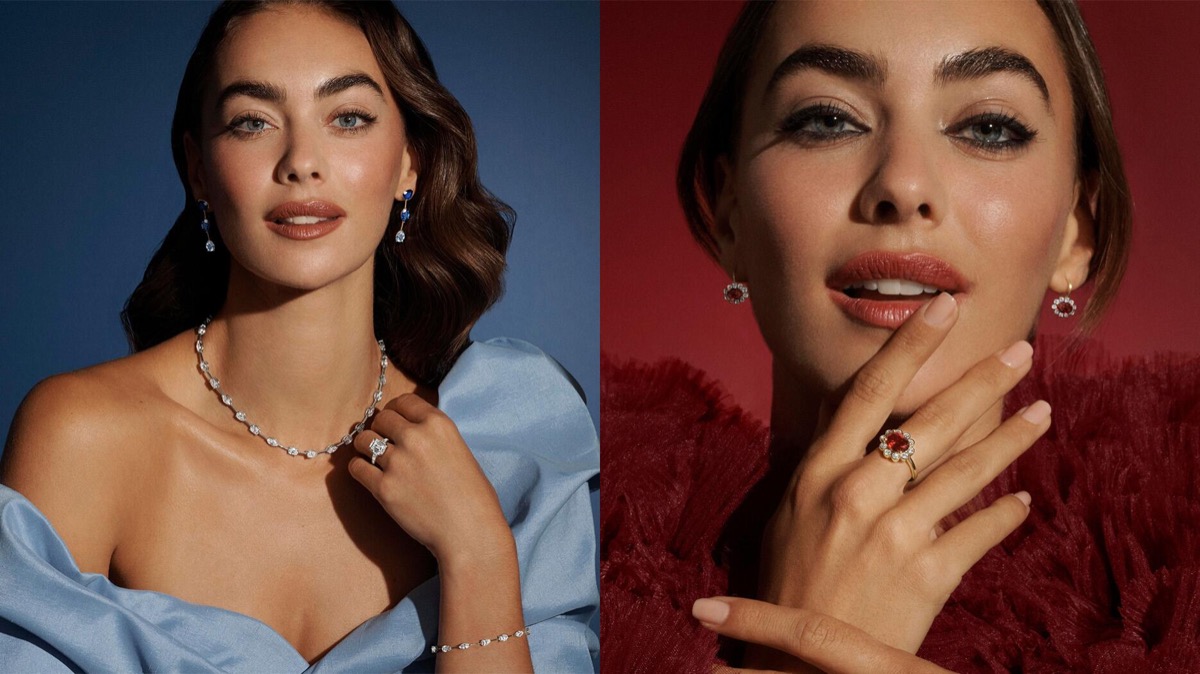 Two models wearing sapphire and ruby pieces from the Elizabeth Taylor Collection
